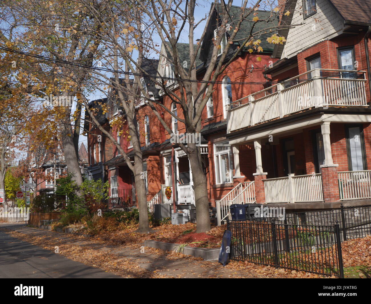 Victorian row of houses with gable roofs Stock Photo - Alamy