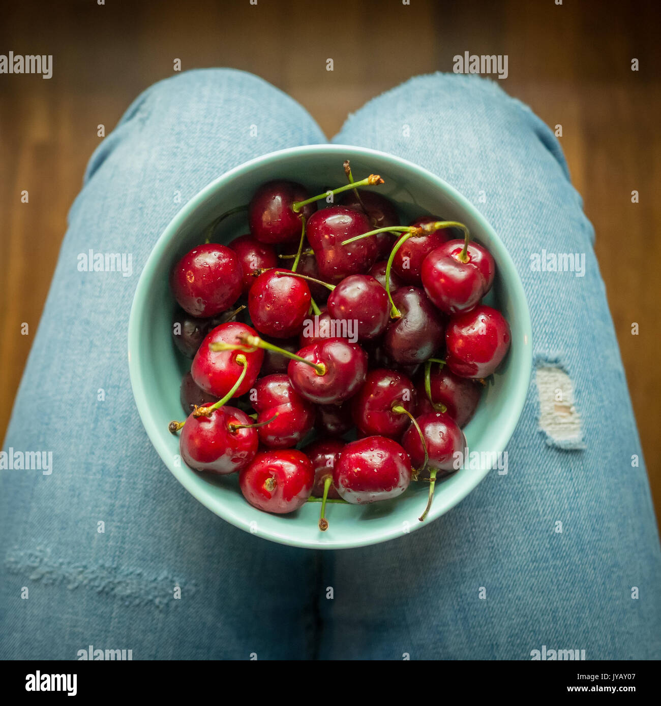 Wearing red top and blue jeans hi-res stock photography and images - Alamy