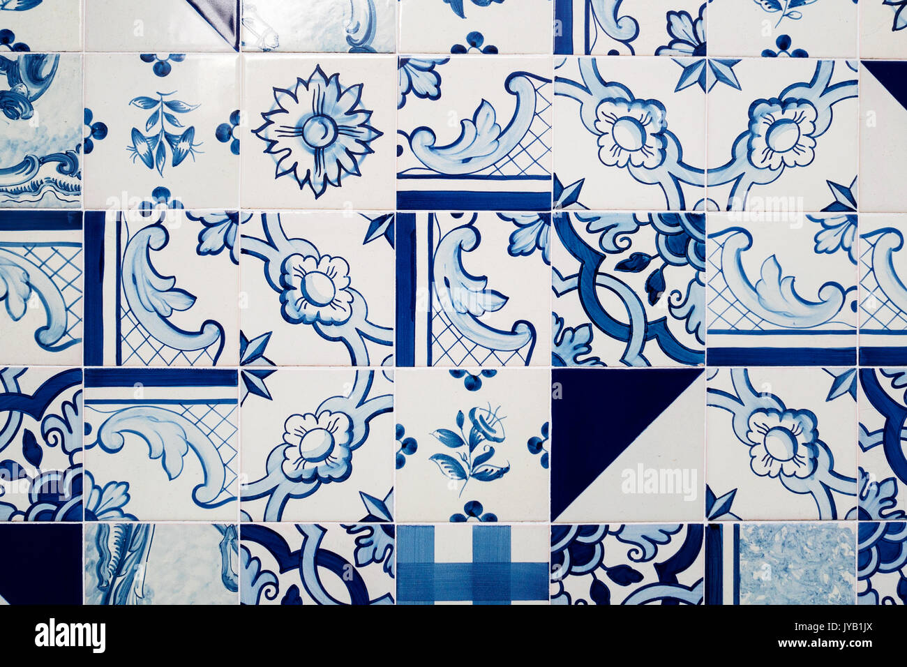 White and blue tiles decorated with abstract decors. Landscape format. Stock Photo