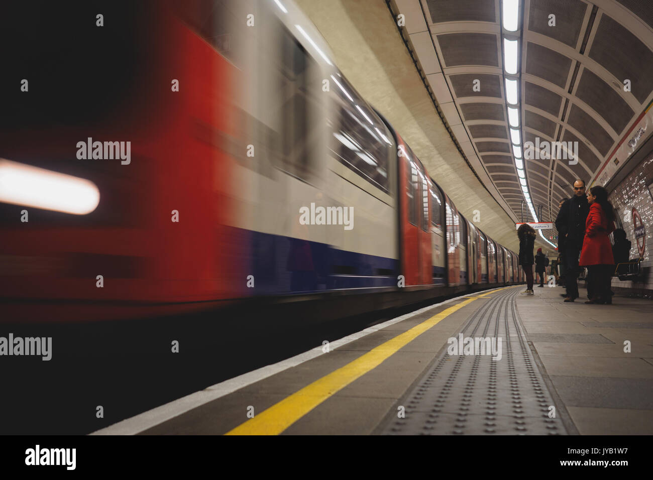 London underground platform with train in movement. London, 2017. Landscape format. Stock Photo