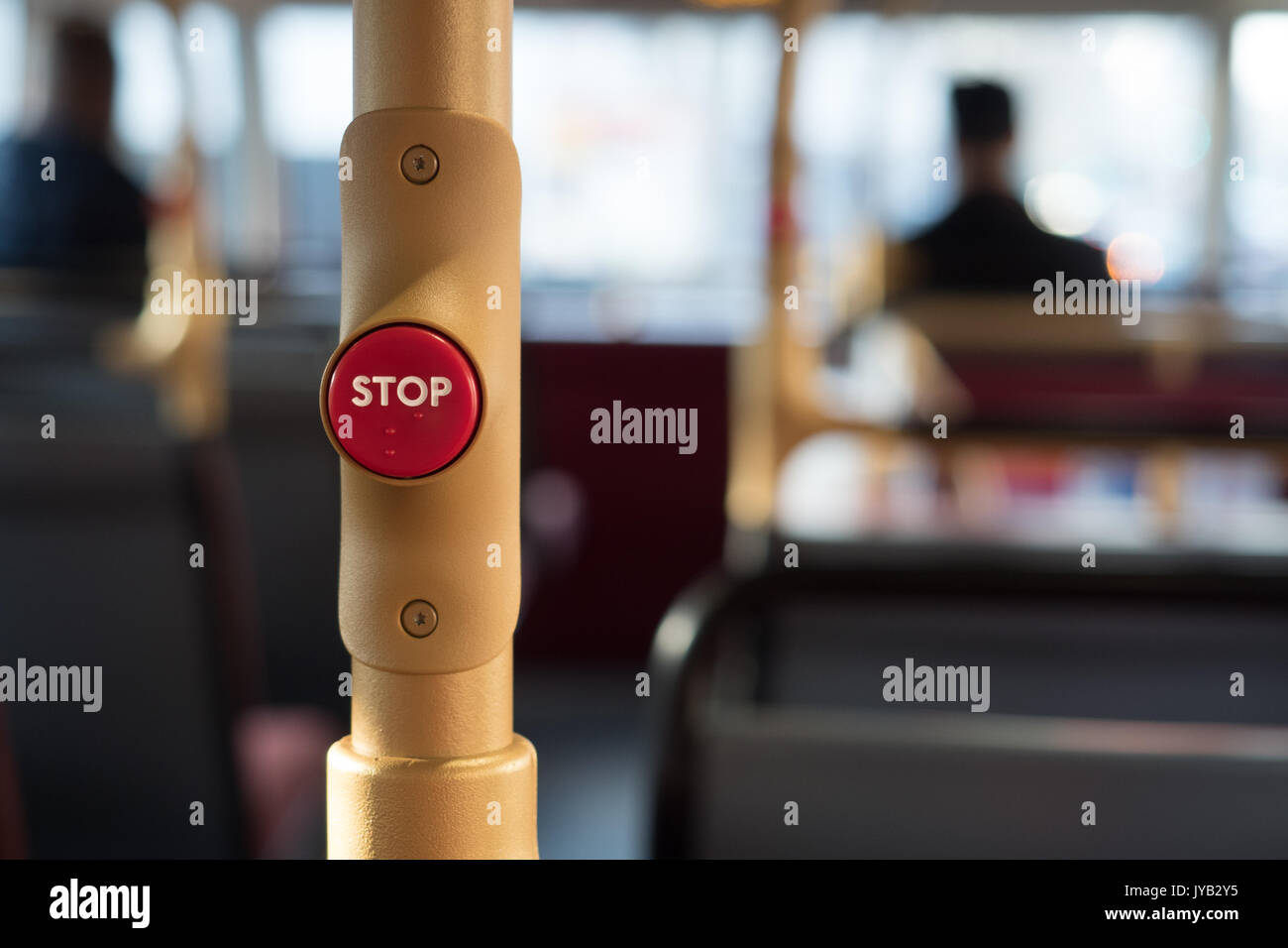 Stop button on a London bus with a blurred background. London, 2017 Stock Photo