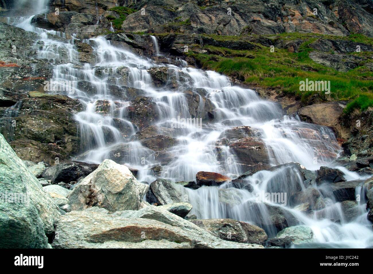 A waterfall in the Roseg Valley, Val Roseg, Engadine Switzerland Europe Stock Photo