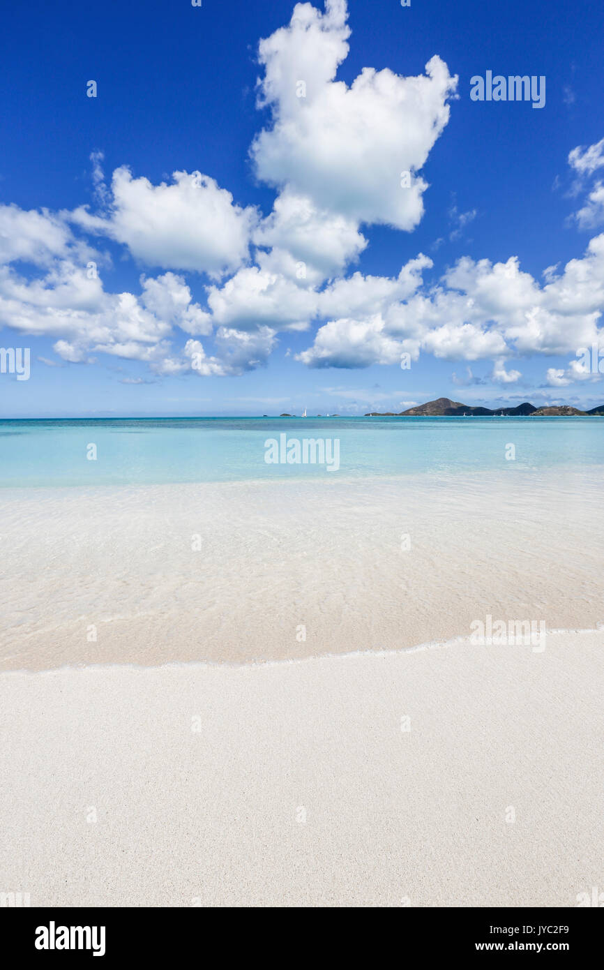 Blue sky frames the white sand and the turquoise Caribbean sea Ffryers Beach Antigua and Barbuda Leeward Islands West Indies Stock Photo