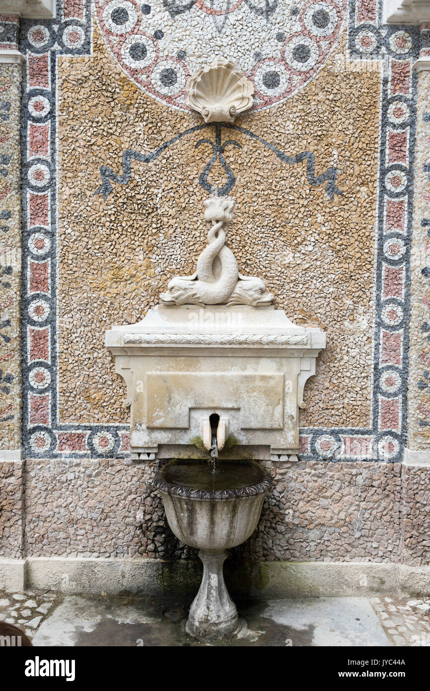 Details of a decorated and ancient fountain of Quinta da Regaleira estate Sintra Portugal Properties Europe Stock Photo