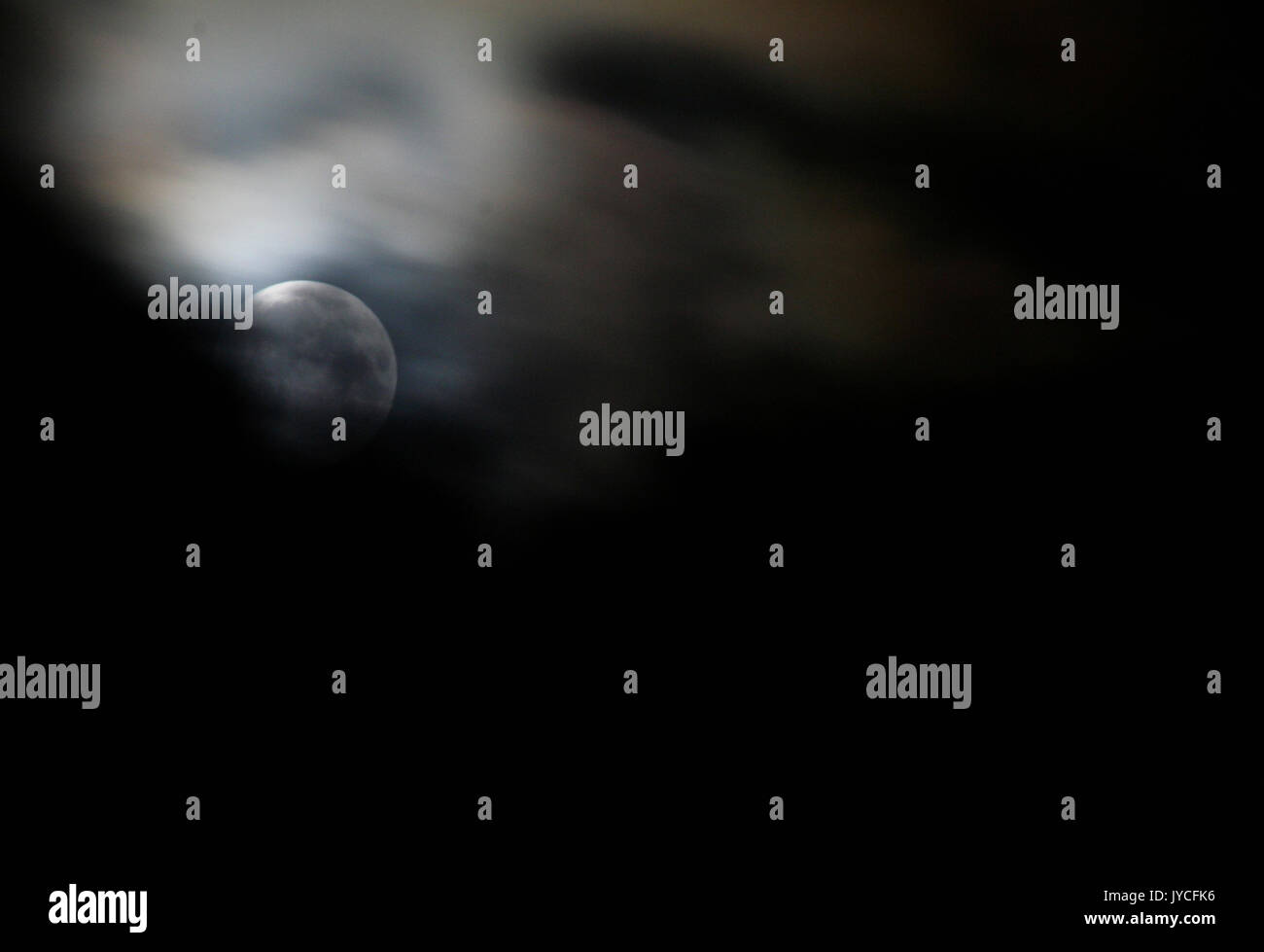 Full Moon with clouds Stock Photo - Alamy