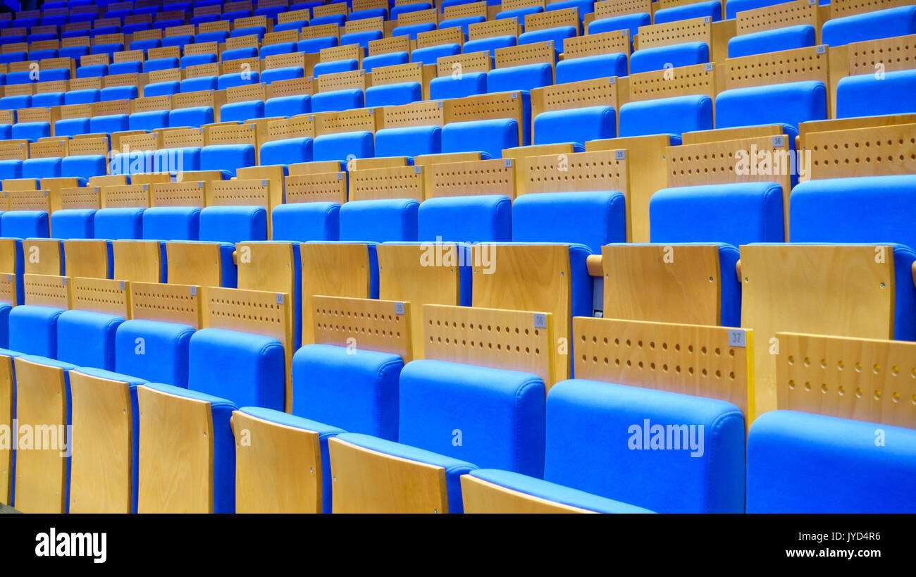 Empty blue seats at the hall Stock Photo