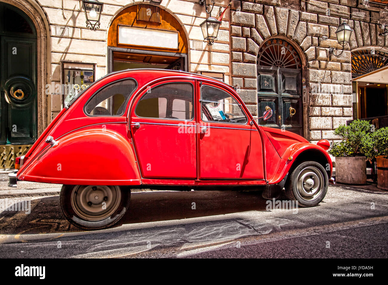 Citroen 2CV6 retro car at the city street, Rome, Italy Stock Photo