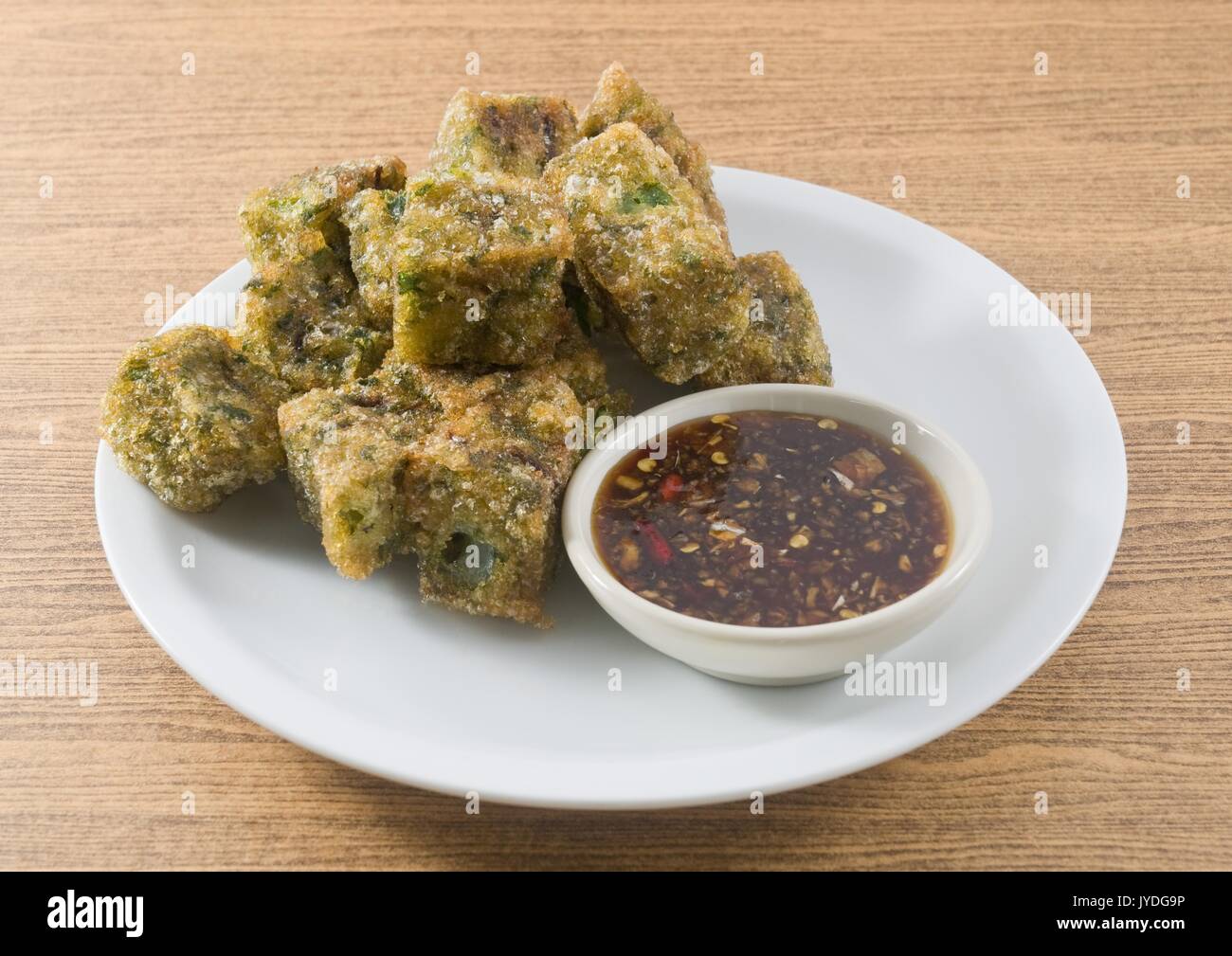 Plate of Fried Chinese Pancake or Fried Steamed Dumpling Made of Garlic