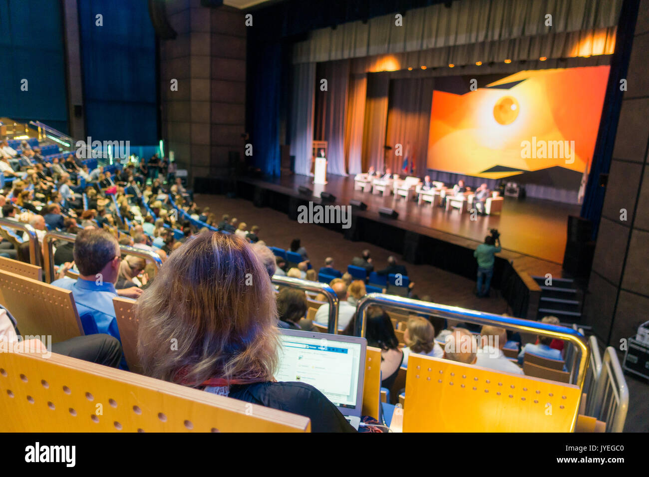 Audience listens to the lecturer Stock Photo - Alamy