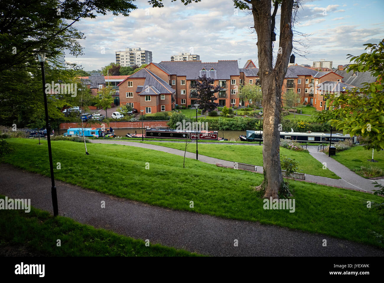 Canal boats moored outside an old people’s home in Chester Stock Photo