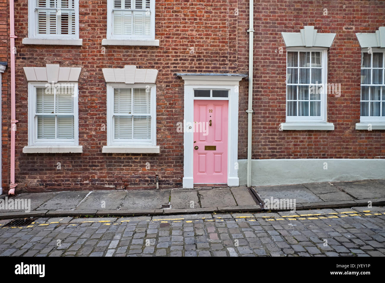 Pink front door in Georgian house, Chester Stock Photo