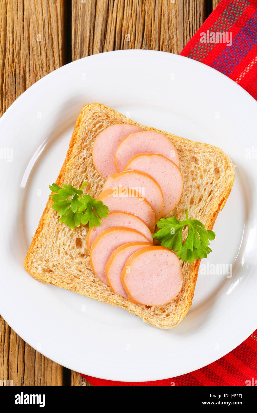 Whole Wheat Bread With Slices Of Lean Sausage Stock Photo Alamy
