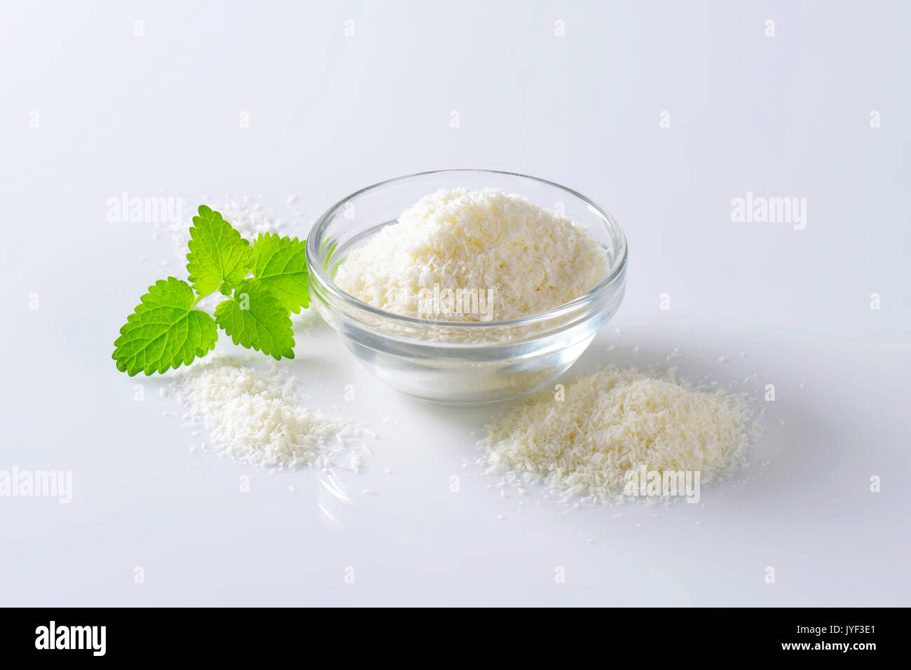 Dried grated unsweetened coconut meat Stock Photo Alamy