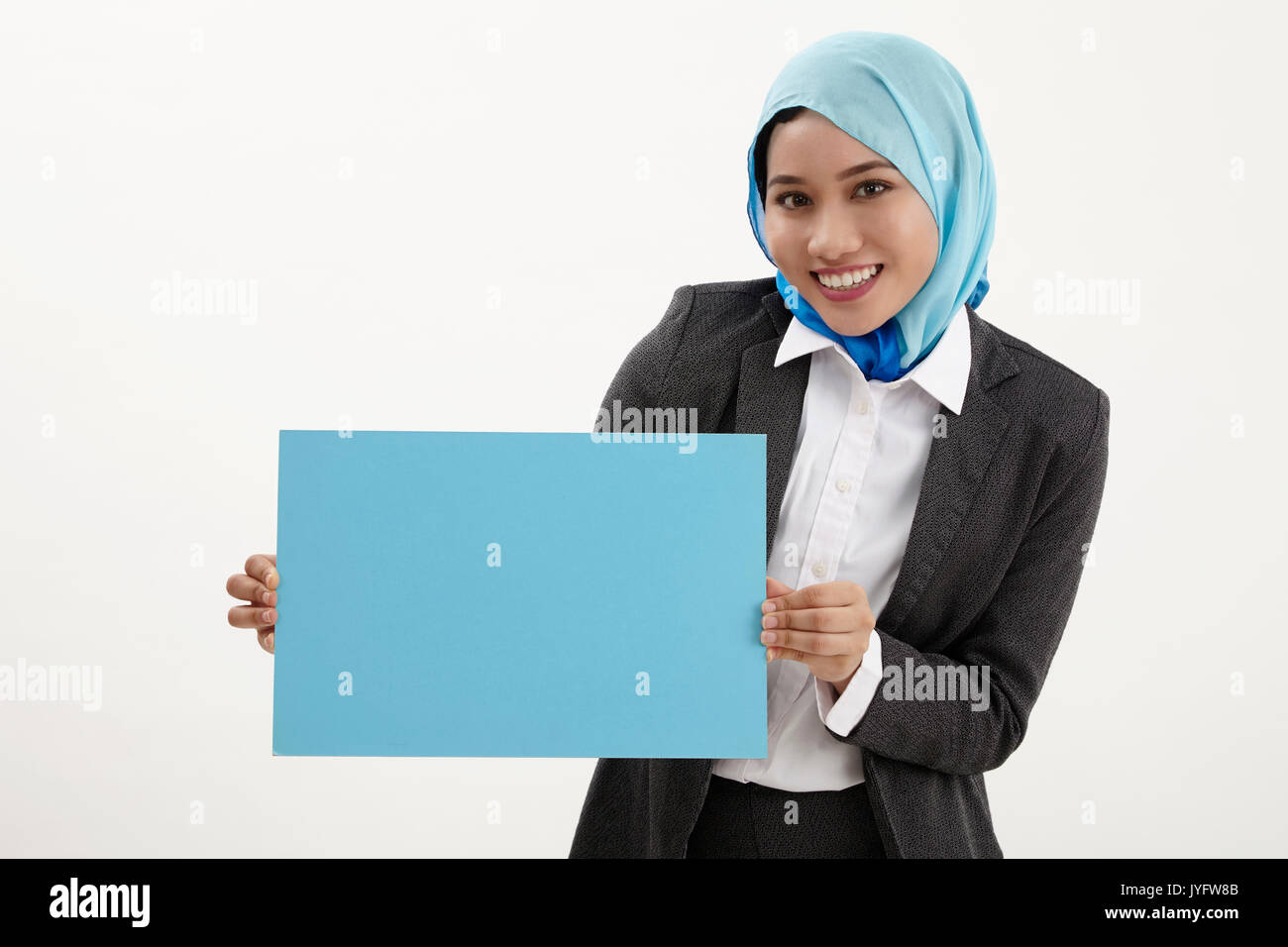 malay business woman with tudung holding a placard Stock Photo Alamy