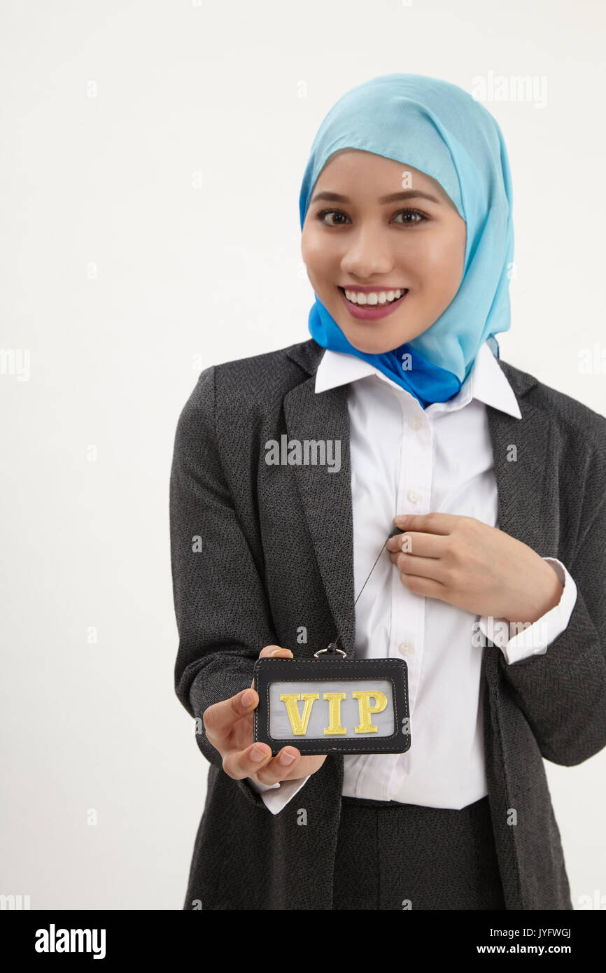 Malay Business Woman Holding A Vip Pass Card Stock Photo Alamy