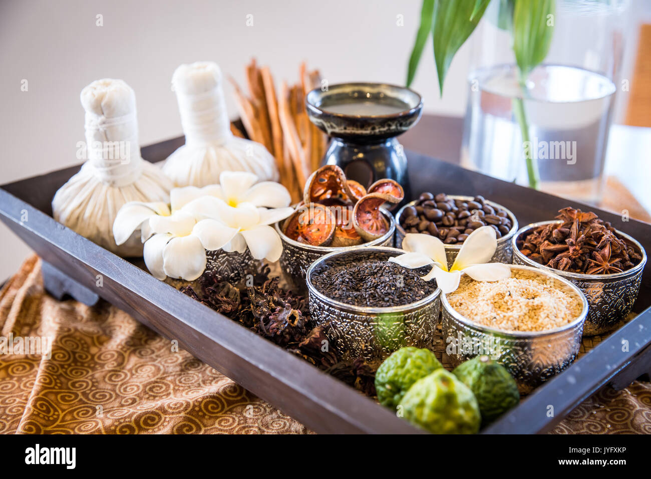 spa and massage accessories on wooden tray Stock Photo - Alamy