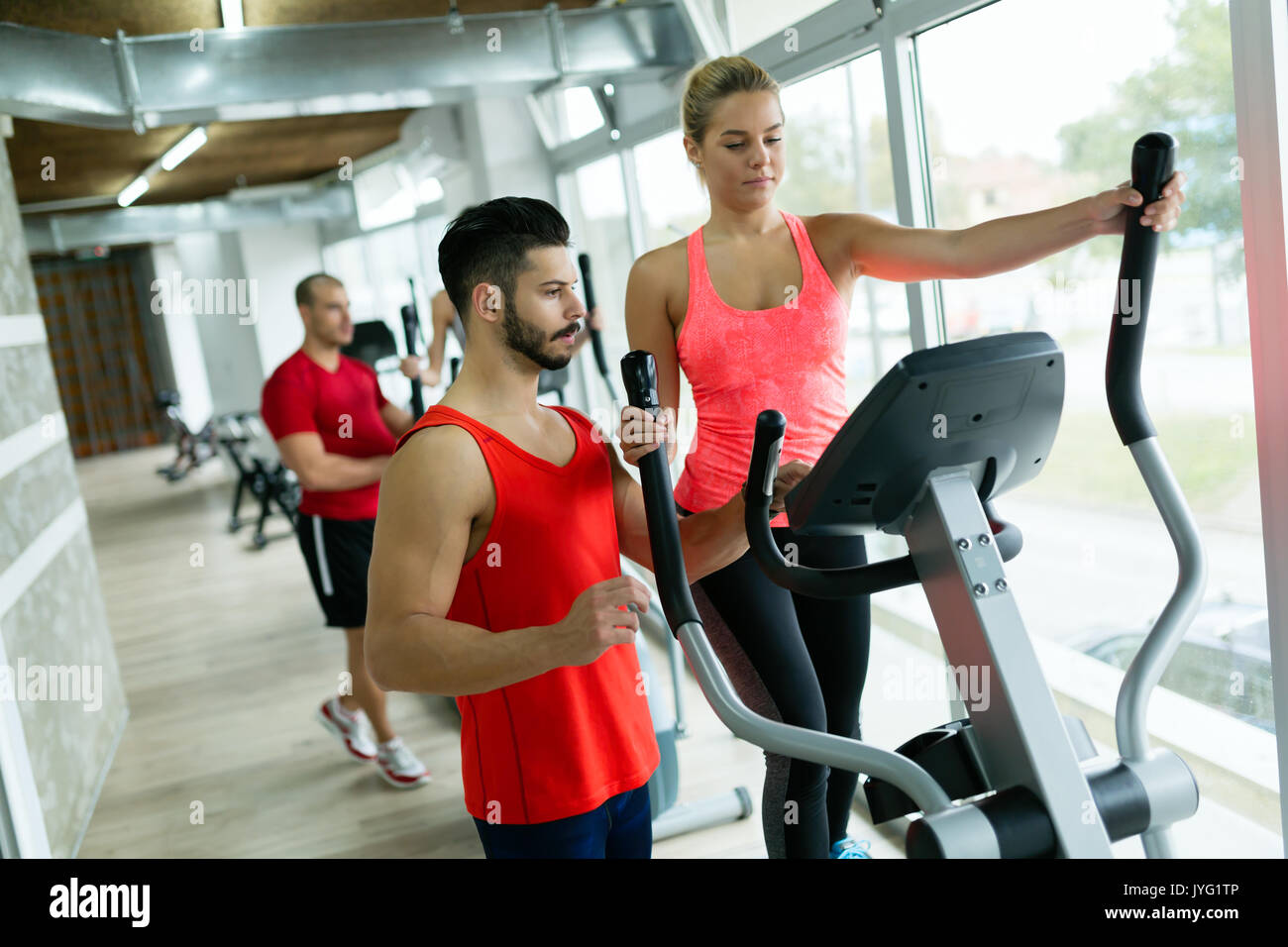 Attractive woman working cardio exercises with trainer Stock Photo
