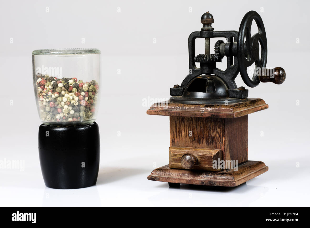 Old stylish coffee grinder on white isolated background Stock Photo