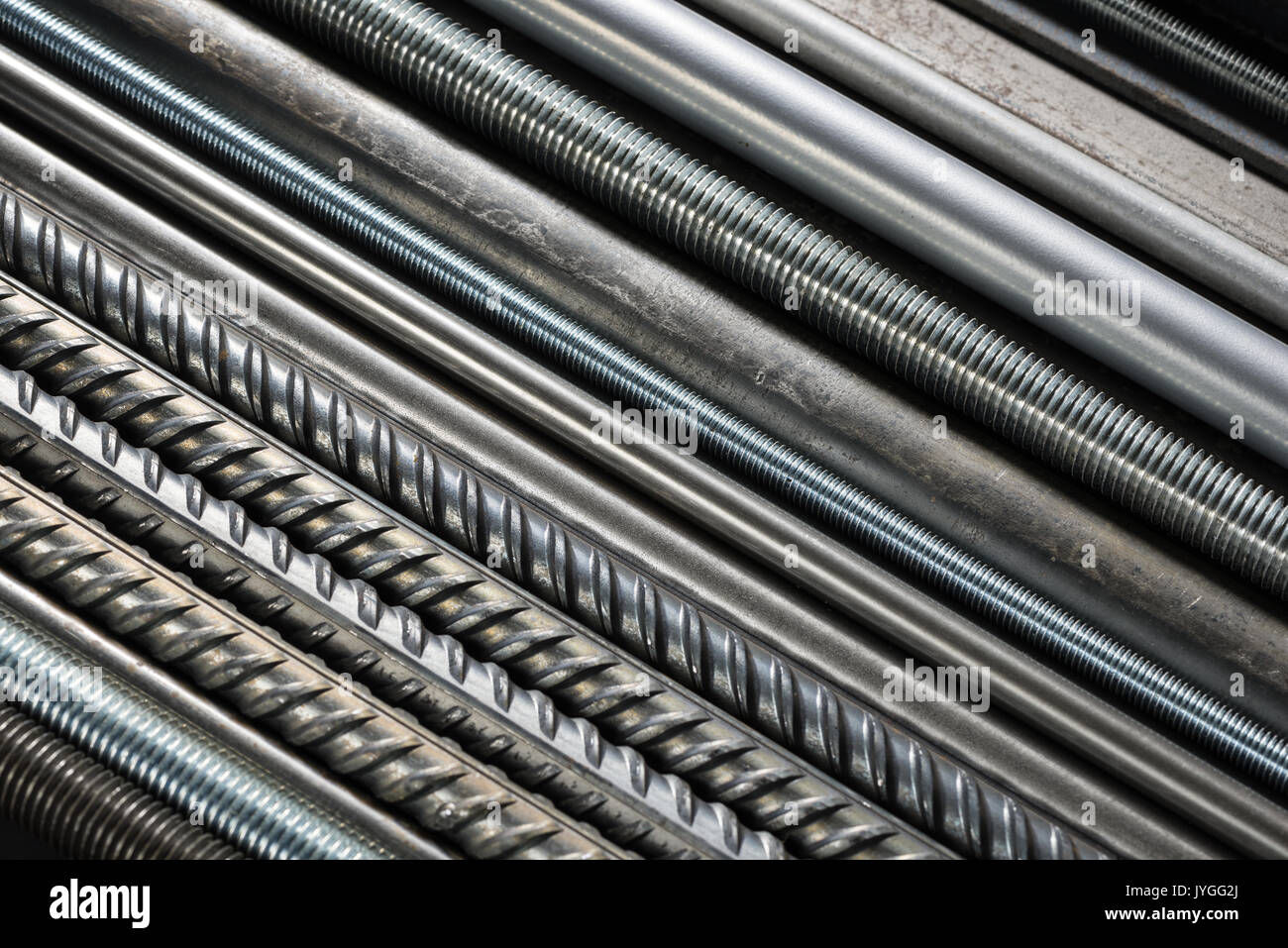 Metal pipes and rods. Steel materials, construction supplies. Stock Photo
