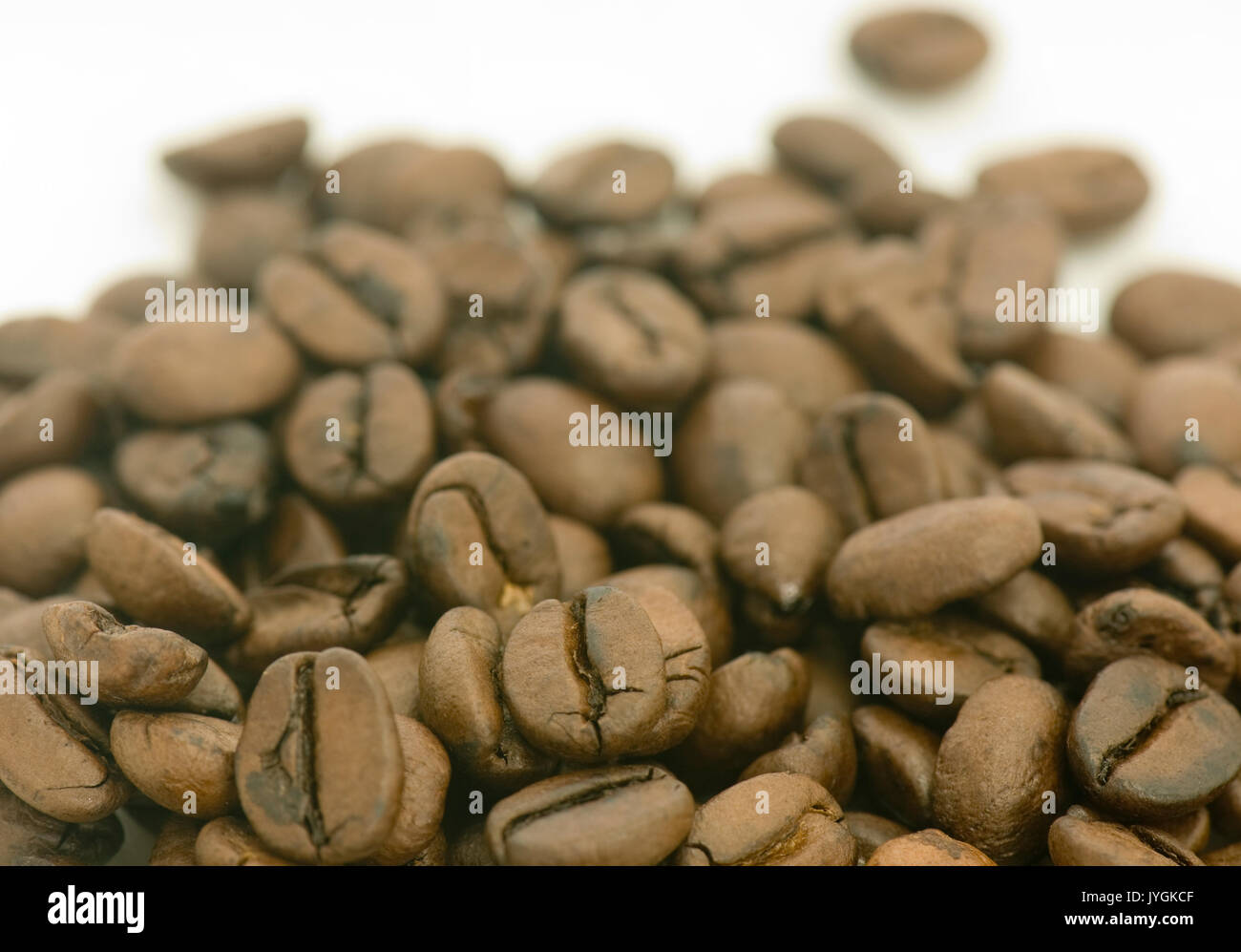 Pile of roasted coffee beans Stock Photo - Alamy