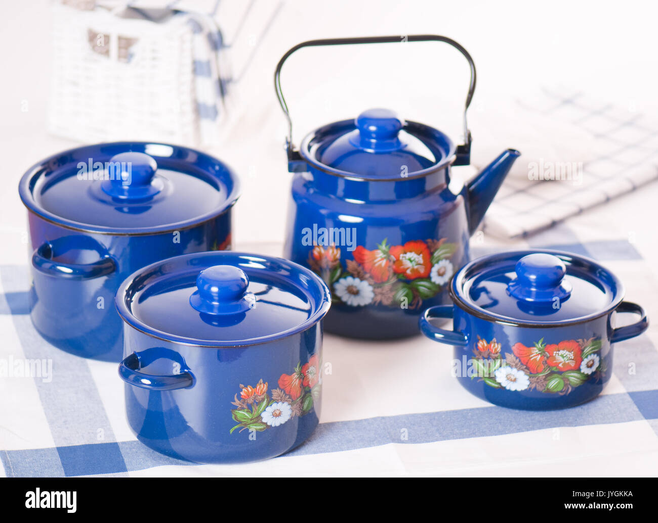 Kitchen utensil set of blue pots and kettle Stock Photo Alamy