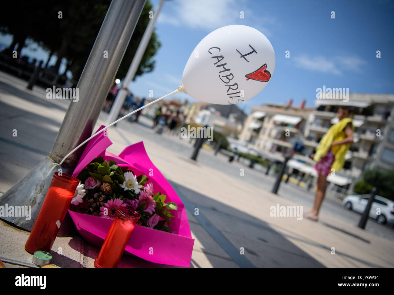 A ballon saying 'I love Cambrils' can be seen next to candles and flowers  on the promenade of Cambrils, Spain, 19 August 2017. In the beach resort  100 kilometres southwest of Barcelona,