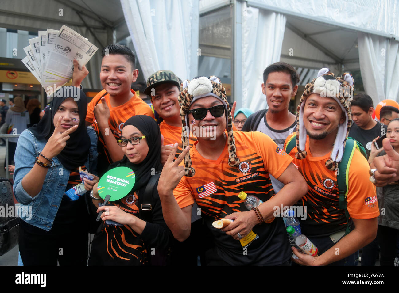 Malaysian wearing RIMAU costumes attending the opening ceremony of 29th SEA games. Credit: Calvin Chan/Alamy Live News Stock Photo