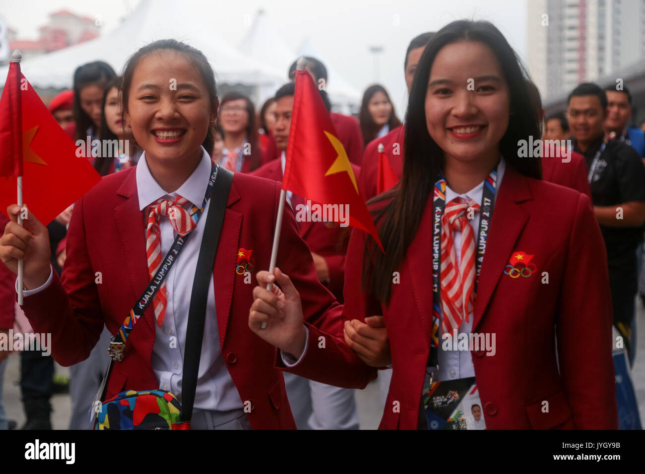 Vietnam officers group outside the national stadium during the opening ceremony of 29th SEA games. Credit: Calvin Chan/Alamy Live News Stock Photo