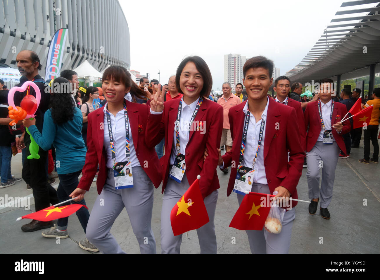 Vietnam officers group outside the national stadium during the opening ceremony of 29th SEA games. Credit: Calvin Chan/Alamy Live News Stock Photo