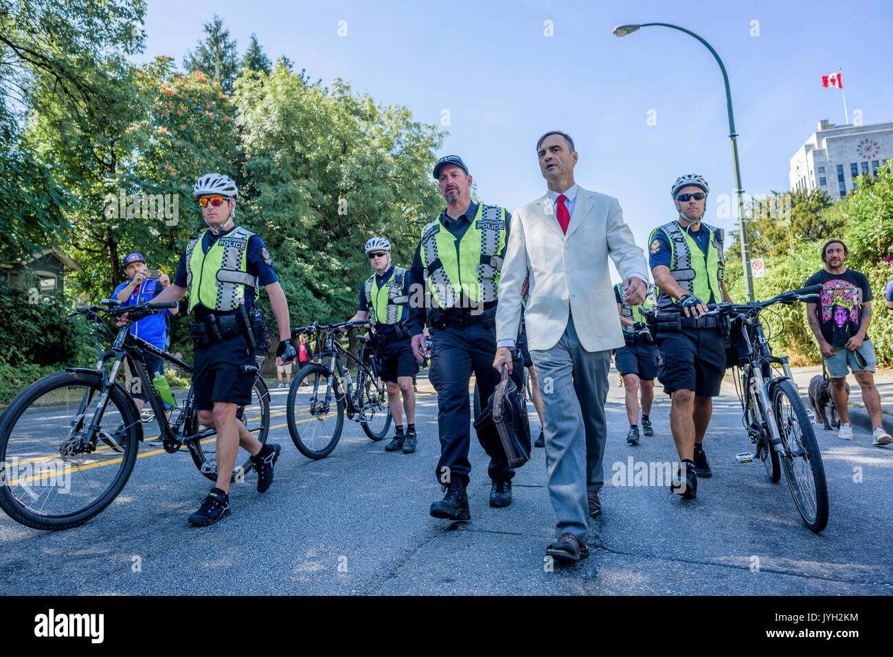 Vancouver, Canada. 19th Aug, 2017. Self professed nazi needs police protection at Anti-Racism rally, City Hall, Vancouver, British Columbia, Canada. Credit: Michael Wheatley/Alamy Live News Stock Photo