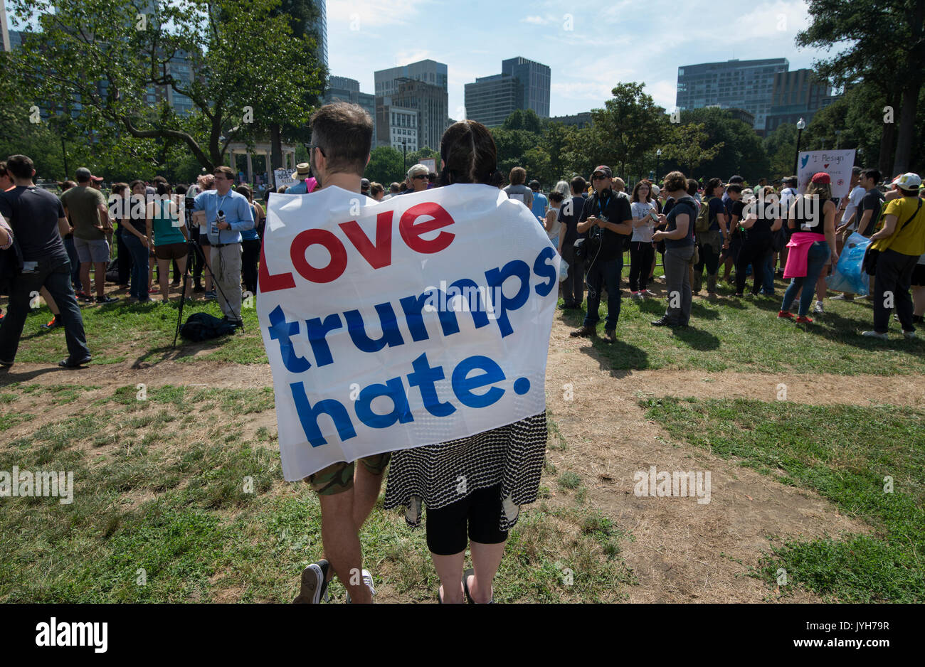Boston, USA. 19th Aug, 2017. Boston police estimated that up to 40,000 demonstrators gathered at the center of the city at the Boston Common, the United States oldest public park, as a counter protest to a “free speech rally” that was rumored to be attended by white-supremacist groups and individuals involved in the Charlottesville, VA., demonstration that took the life 32-year-old Heather Heyer in August or 2017. The “free speech rally was attended by less than 100 mostly right wing supporters of President Donald Trump. Credit: Chuck Nacke/Alamy Live News Stock Photo