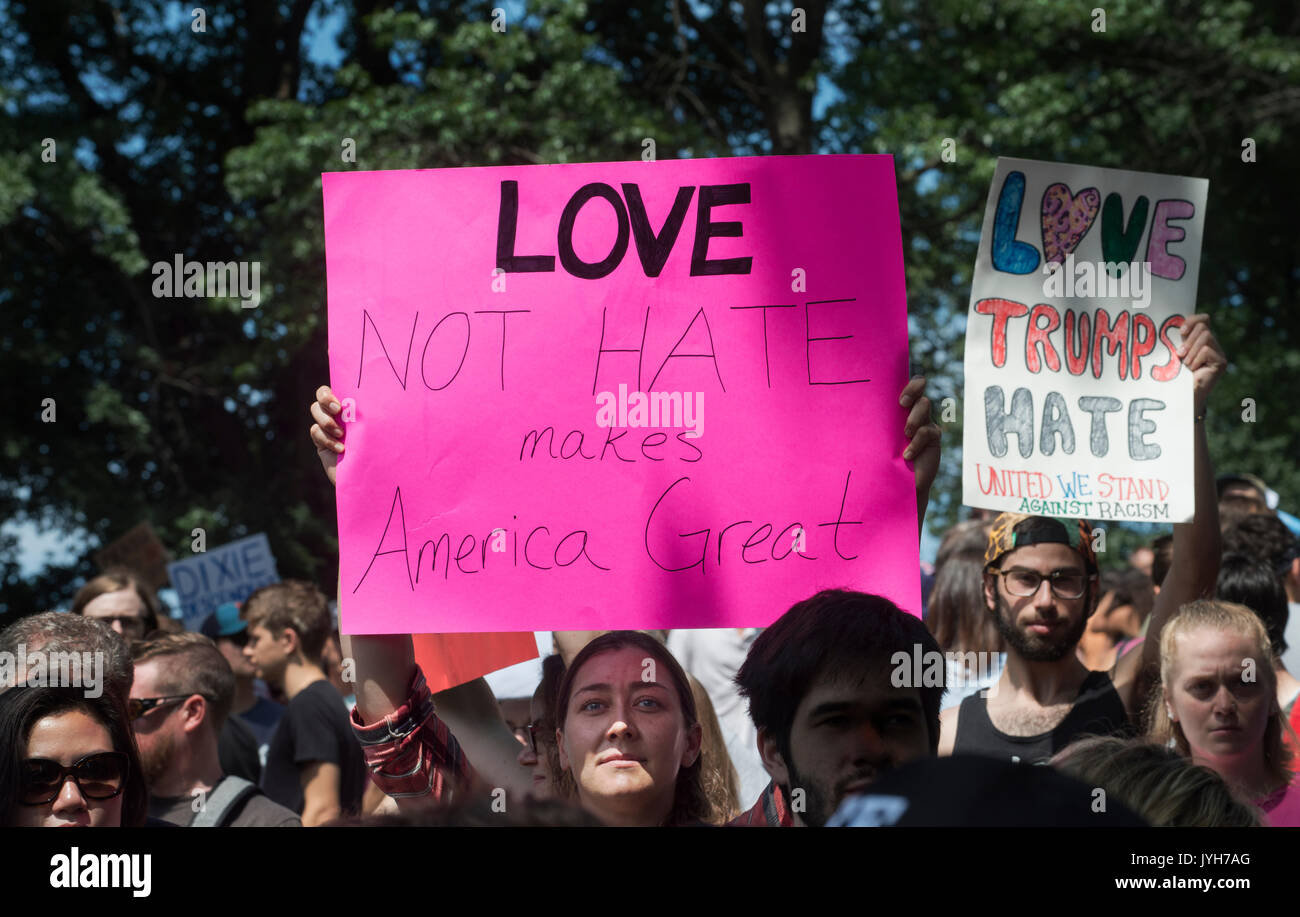Boston, USA. 19th Aug, 2017. Boston police estimated that 40,000 counterdemonstrators gathered at the center of the city at the Boston Common in protest of a “Boston free speech” rally that was rumored to be attended by white-supremacist groups and individuals involved in the Charlottesville, VA., demonstration that took the life of a Heather Heyer in Aug. of 2017. The rally, attended by less than 100 right wing supporters of President Trump, started late and ended early with rally attendees needing to be escorted out of the common by police  in riot gear.   Chuck Nacke/Alamy Live News Stock Photo