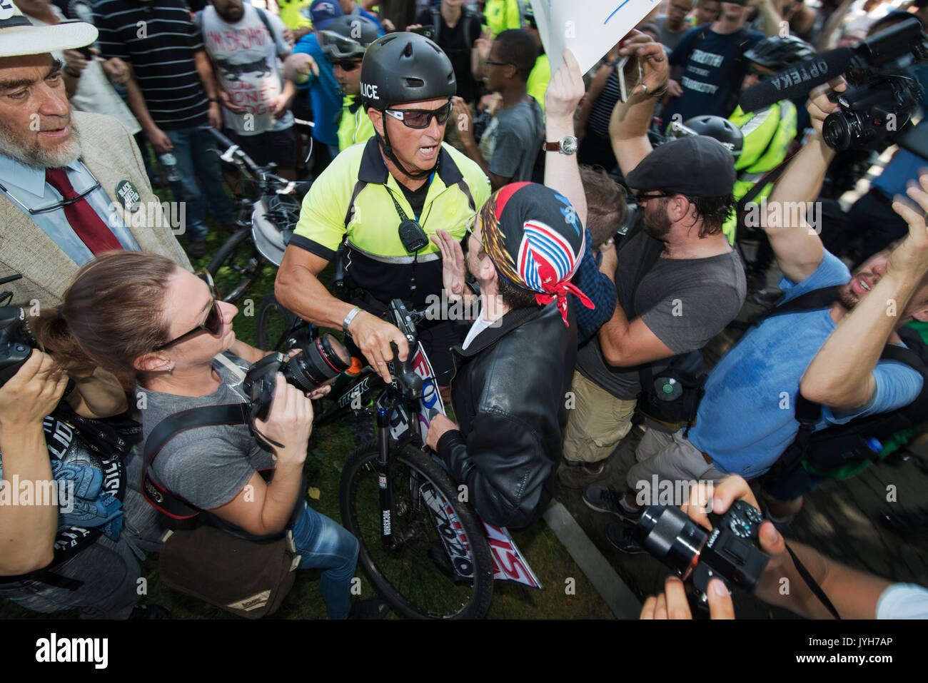 Boston, USA. 19th Aug, 2017. Boston police estimated that up to 40,000 demonstrators gathered at the center of the city at the Boston Common, the United States oldest public park, as a counter protest to a “free speech rally” that was rumored to be attended by white-supremacist groups and individuals involved in the Charlottesville, VA., demonstration that took the life 32-year-old Heather Heyer in August or 2017. The “free speech rally was attended by less than 100 mostly right wing supporters of President Donald Trump. Credit: Chuck Nacke/Alamy Live News Stock Photo