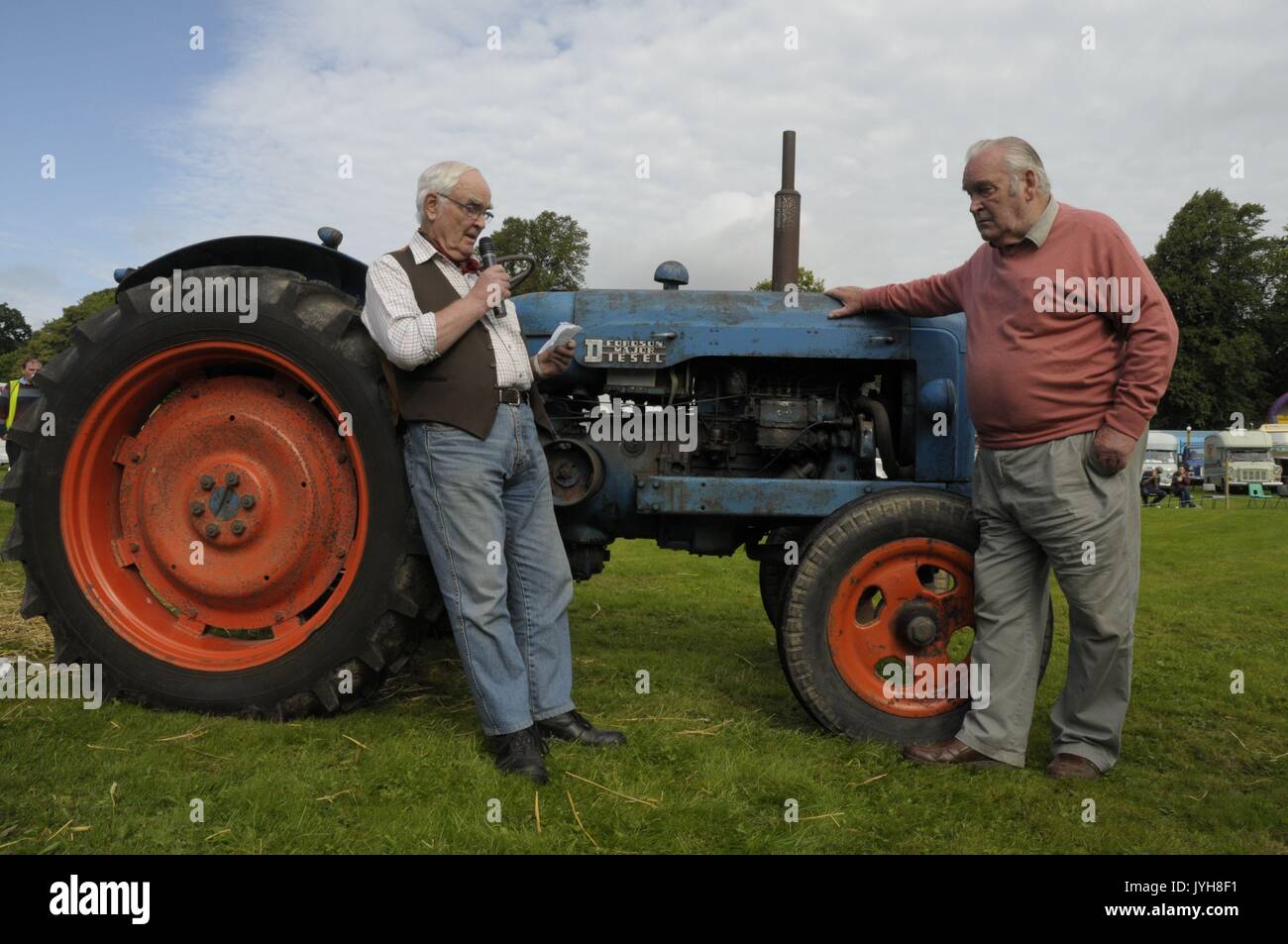 Kington, , UK. 20th Aug, 2017. The Herefordshire market town of Kington came to a standstill while a parade of vintage vehicles made their way to the Kington Vintage Club's 25th Annual Show. Kington Vintage Club members Barry Evans (left) and Alan Bayliss officialy open the show. Credit: Andrew Compton/Alamy Live News Stock Photo