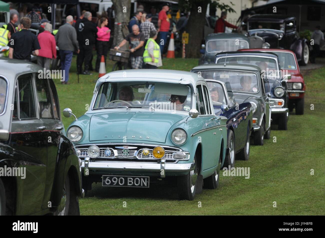 Kington, , UK. 20th Aug, 2017. The Herefordshire market town of Kington came to a standstill while a parade of vintage vehicles made their way to the Kington Vintage Club's 25th Annual Show. Vintage vehicles arrive at the town's Recreation Ground for the event. Credit: Andrew Compton/Alamy Live News Stock Photo