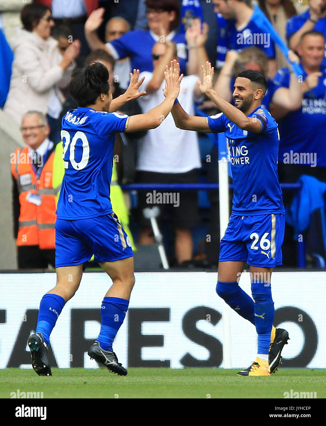 Leicester City S Shinji Okazaki Left Celebrates Scoring His Side S First Goal With Team Mate Riyad Mahrez During The Premier League Match At The King Power Stadium Leicester Stock Photo Alamy