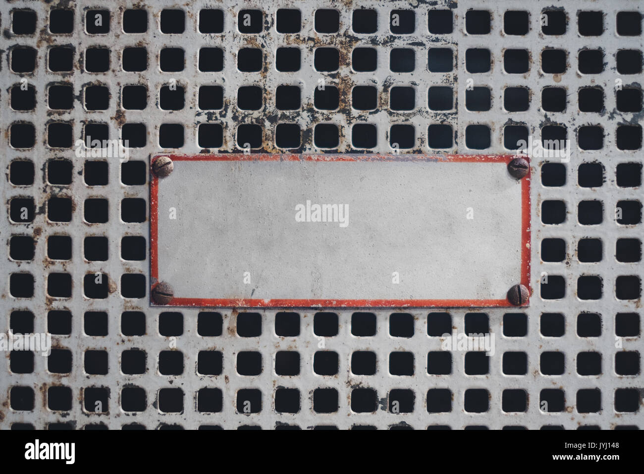 empty sign on rusty grid - blank sign on metal door Stock Photo - Alamy