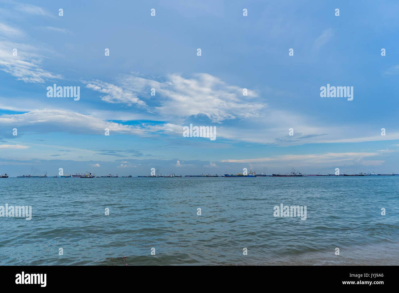 View of the sea from East Coast Park in Singapore under the beautiful blue  sky with cloudy Stock Photo - Alamy