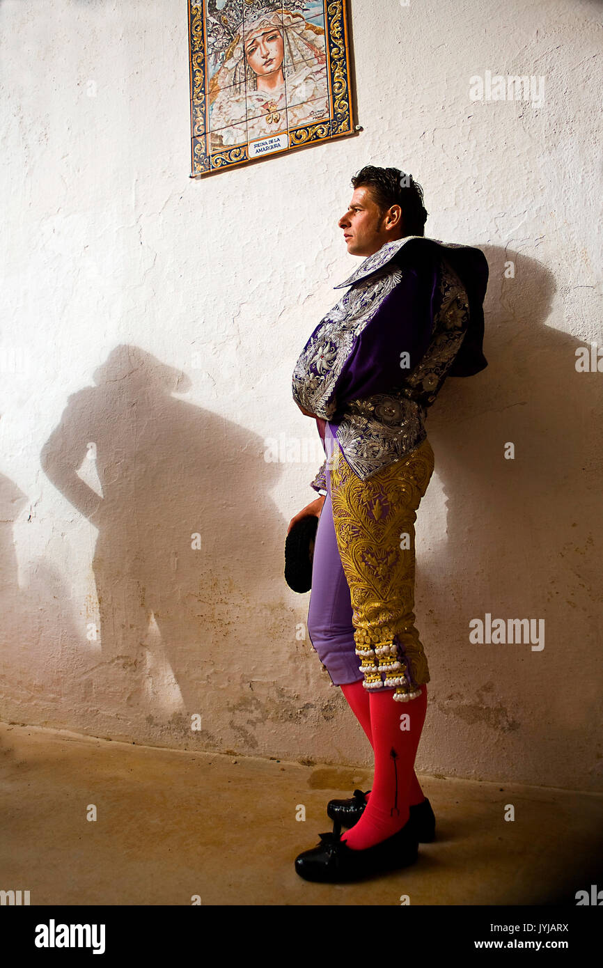 The Spanish Bullfighter David Valiente waiting in the alley of the plaza de toros de Jaen, Spain Stock Photo