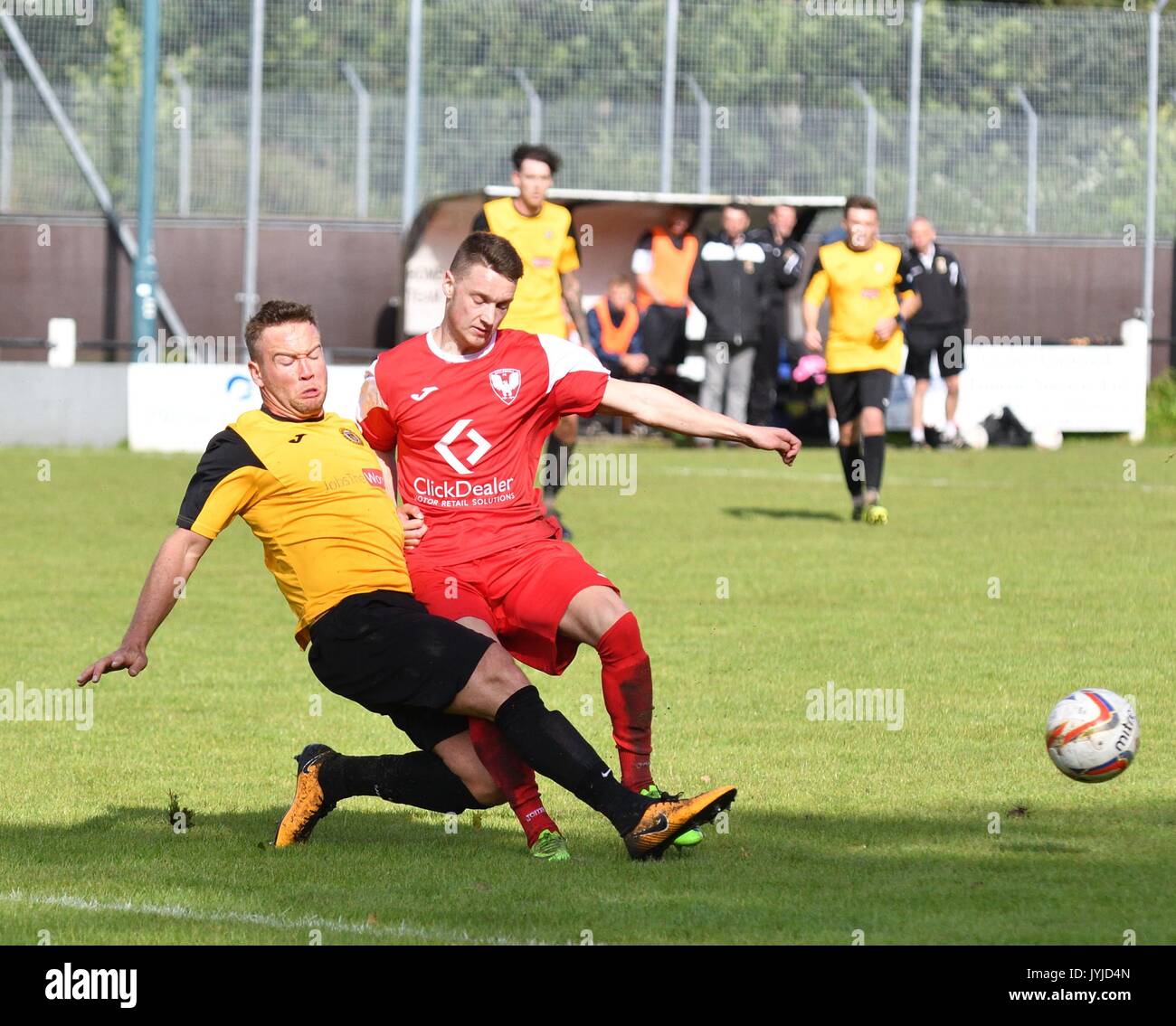 Football action at a non-league match between New Mills and Eccleshall (NOT Eccleshaw) Stock Photo