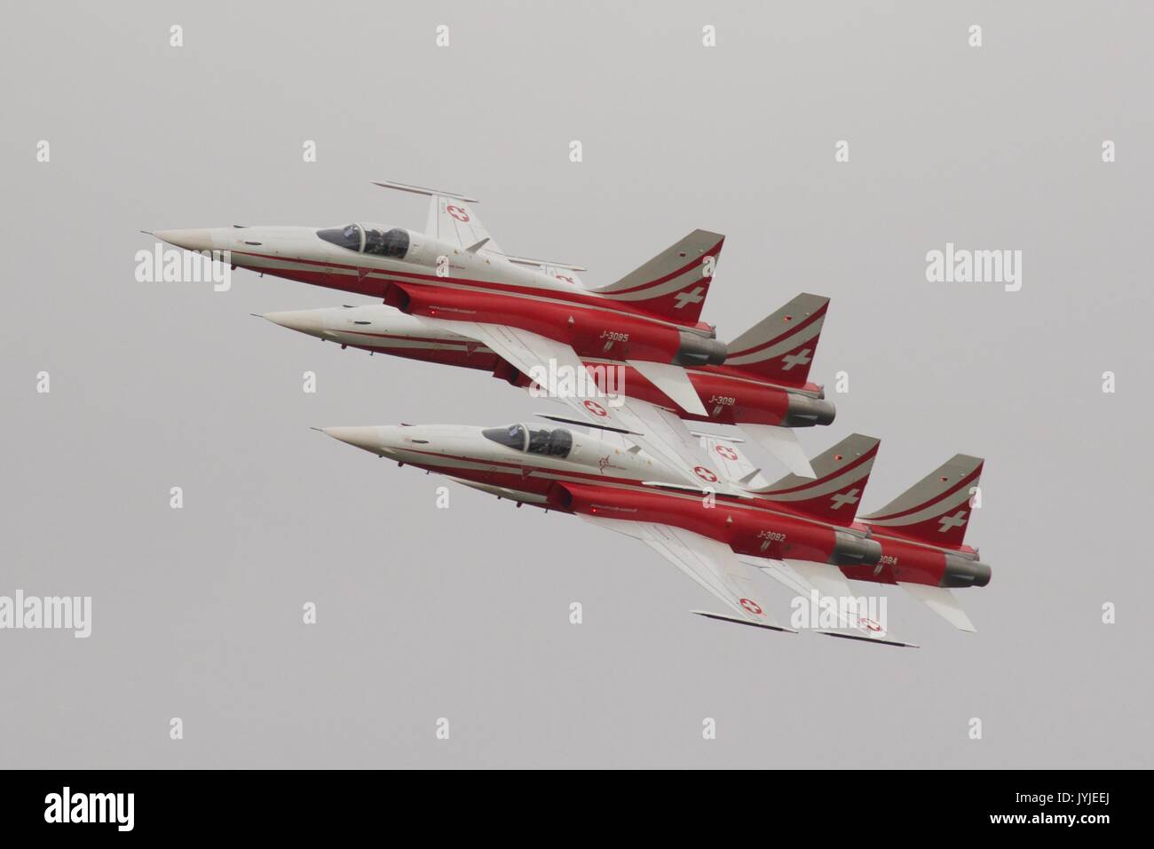 The Patrouille Suisse Northrop F-5E Tigers flying in formation at RIAT 2017 Stock Photo