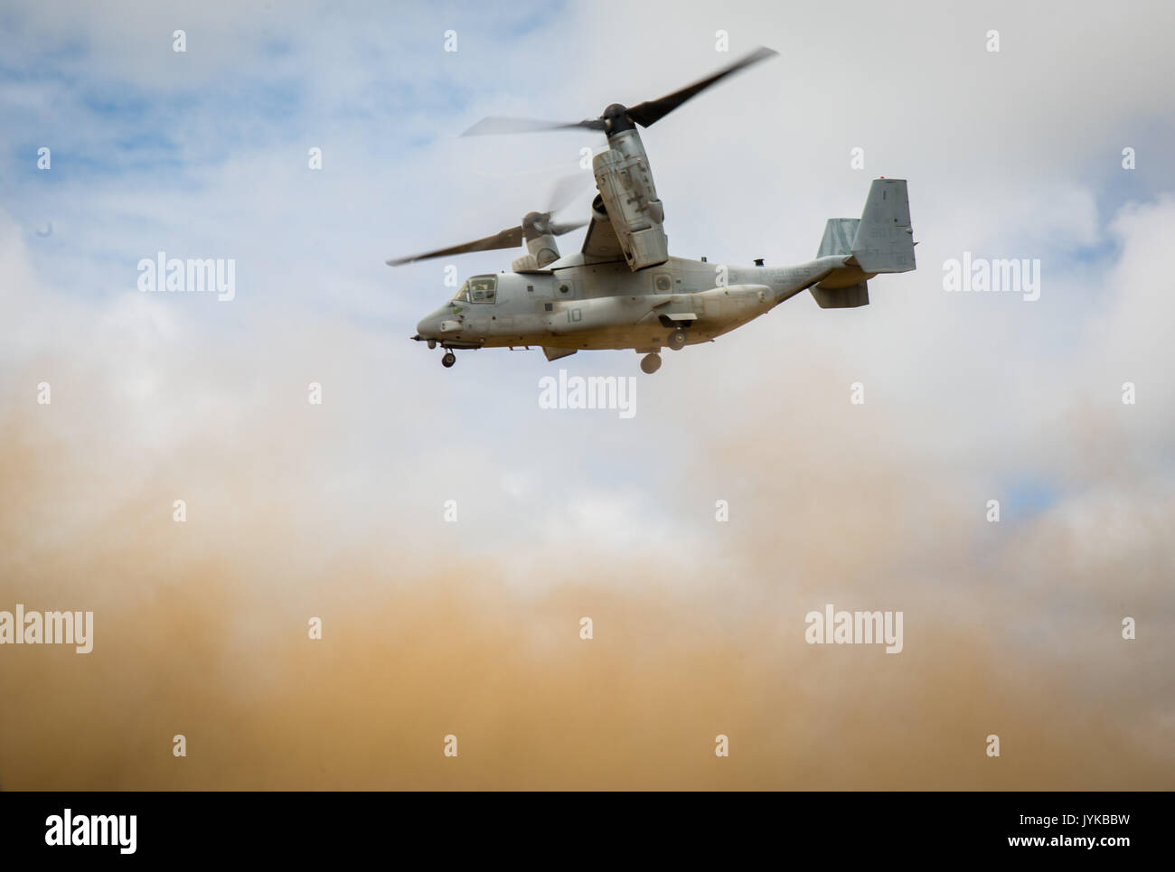 A U.S. Marine Corps MV-22 Osprey soars through the skies over Hokkaido, Japan, August 18, 2017, in support of Northern Viper 2017. This exercise tests the interoperability and bilateral capability of the Japan Ground Self-Defense Force and U.S. Marine Corps forces to work together and provides the opportunity to conduct realistic training in an unfamiliar environment. This combined-joint exercise is held to enhance regional cooperation between participating nations to collectively deter security threats. The aircraft is assigned to Marine Medium Tiltrotor Squadron 262, Marine Aircraft Group 36 Stock Photo