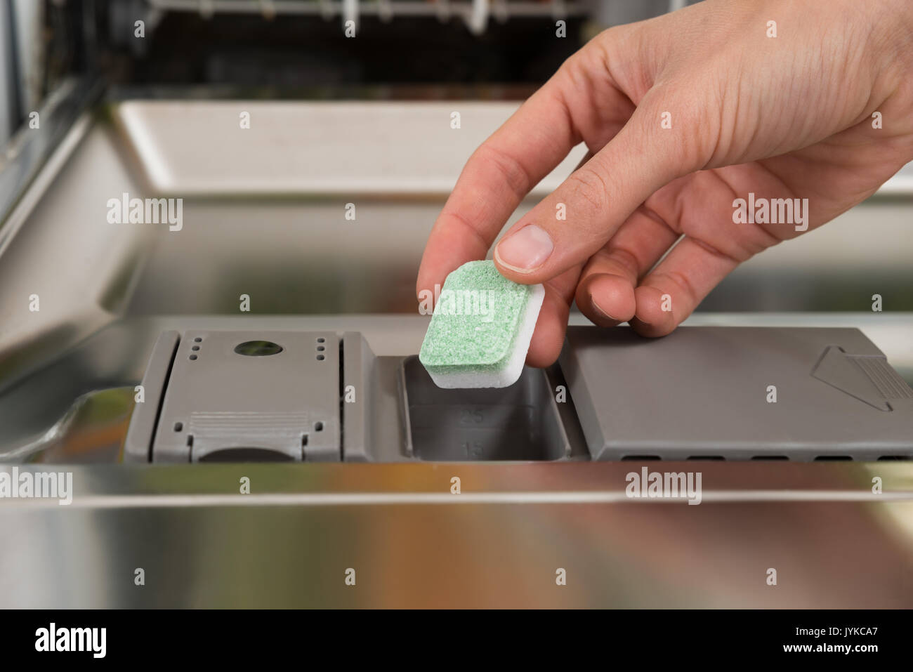 Fairy Platinum All in One dishwasher tablet in soap compartment of  dishwasher Stock Photo - Alamy