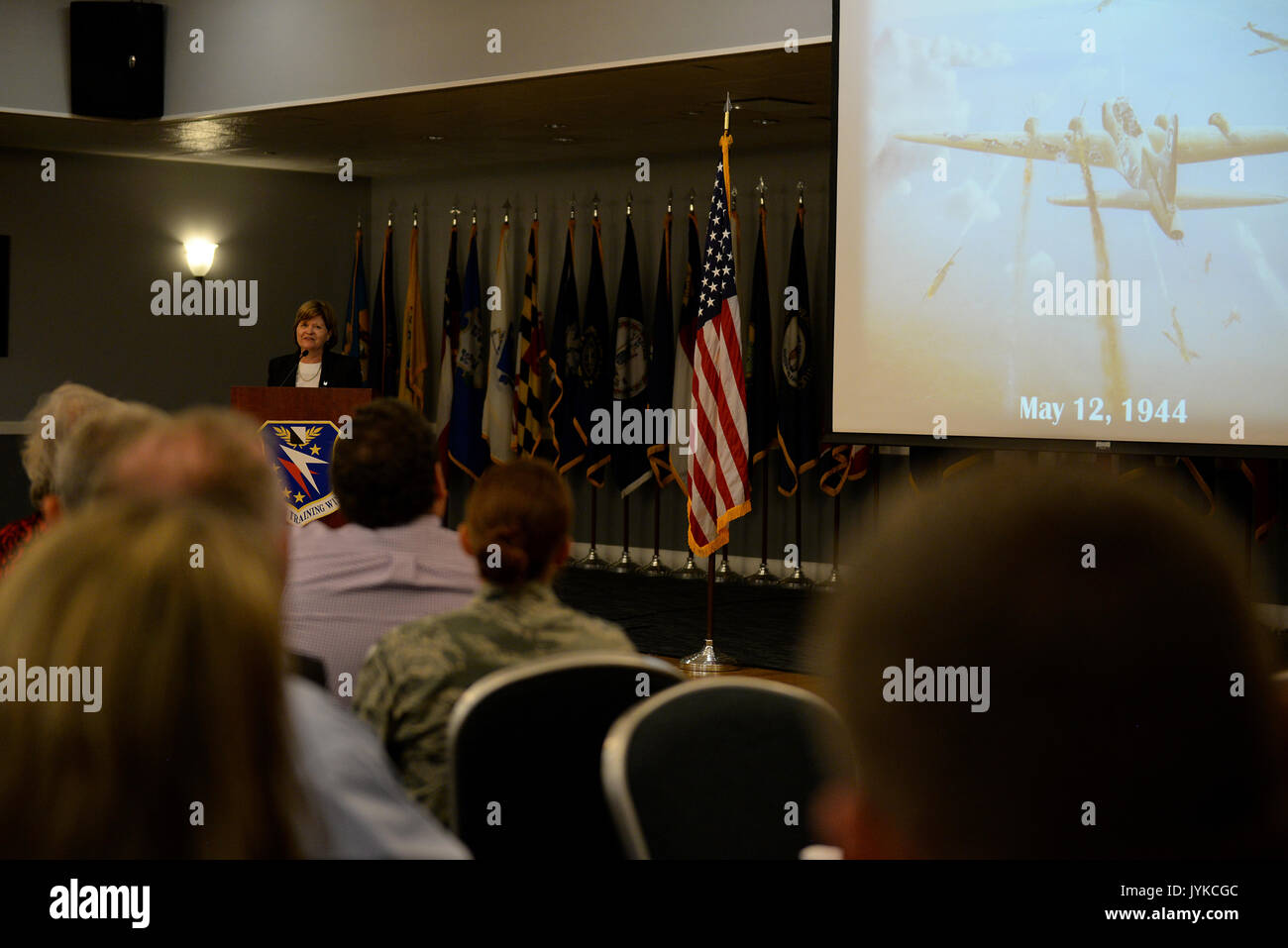 Justice Sharon Lee, from the Tennessee Supreme Court, shares her father’s story with an audience Aug. 11, 2017, on Columbus Air Force Base, Mississippi, during the Base Community Council luncheon. Her father was shot in the head, shoulder, back and wrist during a bombing mission while on board a B-17 Flying Fortress. Some shrapnel was left in his body for his entire life. (U.S. Air Force photo by Airman 1st Class Keith Holcomb) Stock Photo