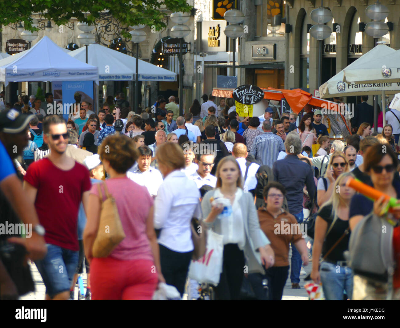 Germany Munich pedestrian zone shopping street crowded crowds tourists traveller Stock Photo