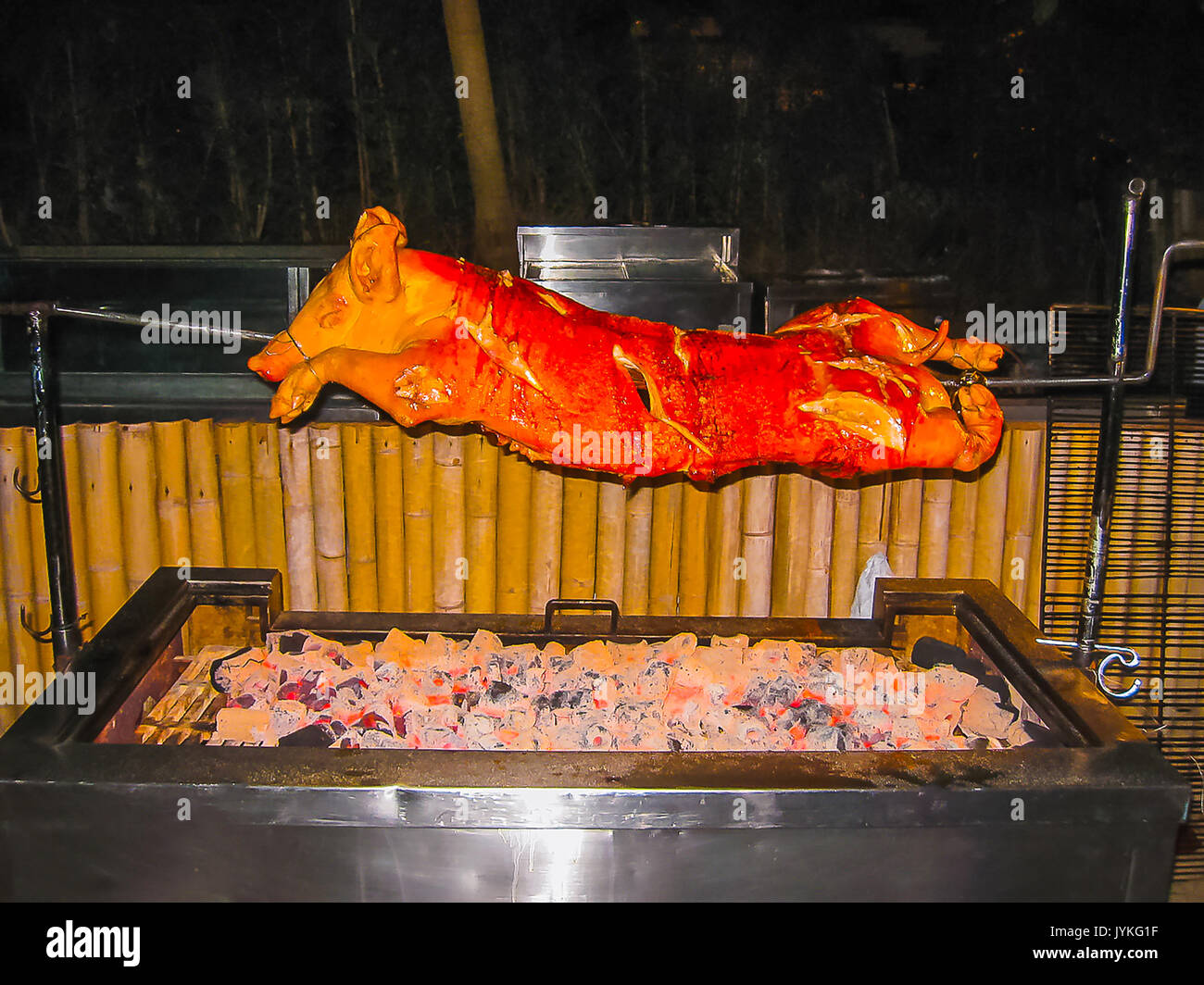 Roasted pig on the spit Stock Photo