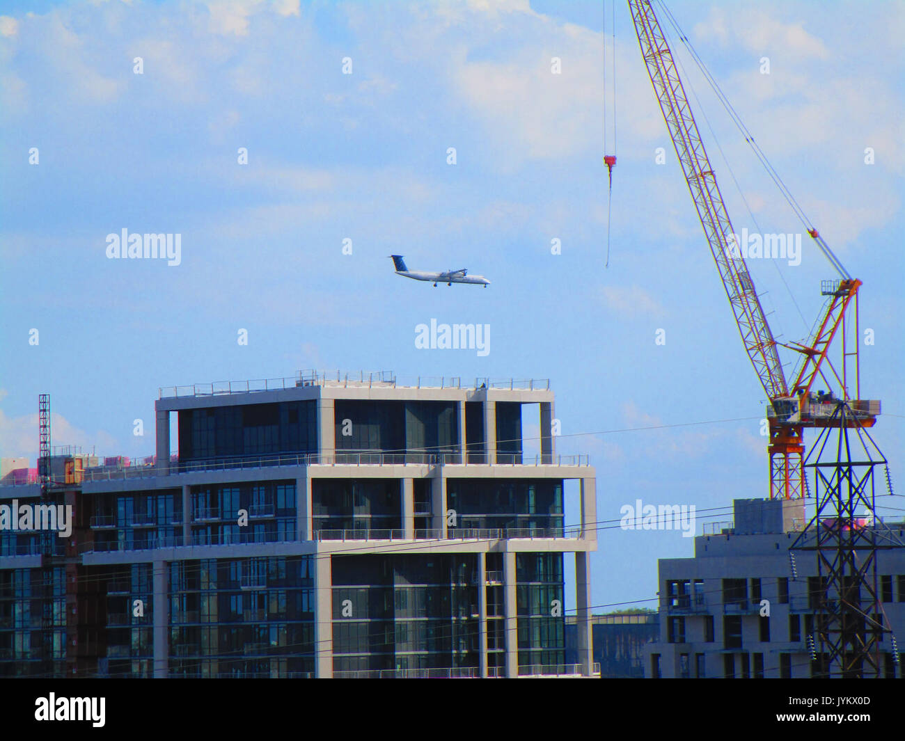 A Dash 8 about to land at Billy Bishop Island Airport, 2017 05 31 (34651724450) (2) Stock Photo