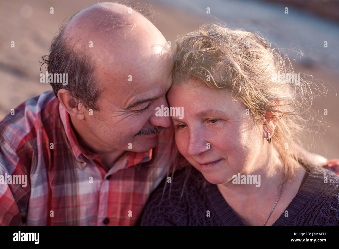 Portrait of a happy romantic couple outdoors. Stock Photo