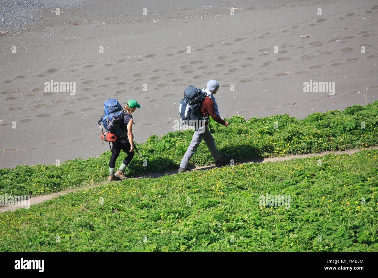 Man woman walk beach hi-res stock photography and images - Alamy