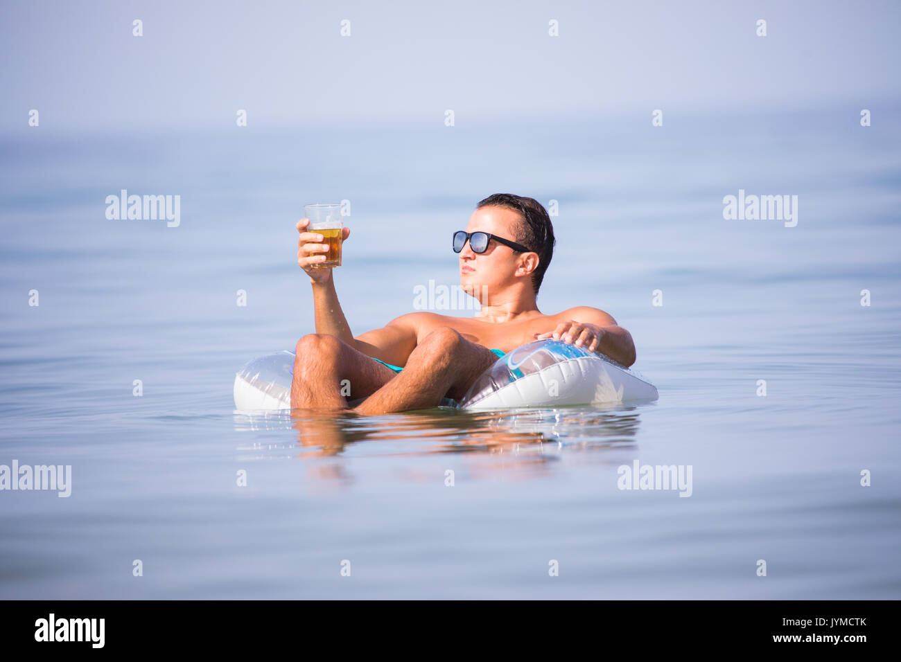 Man in 2024 rubber ring
